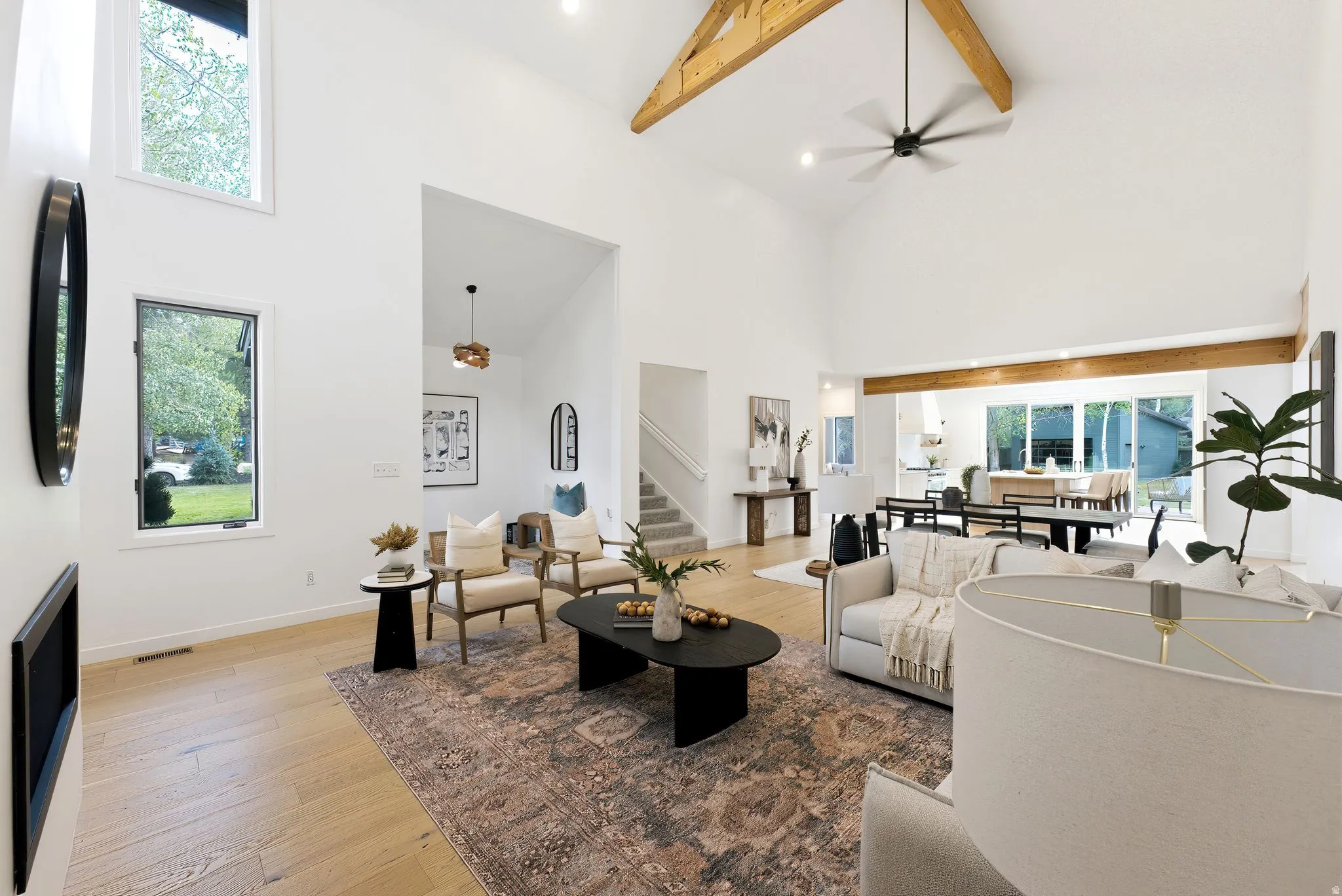Soaring vaulted ceilings with exposed wood beams