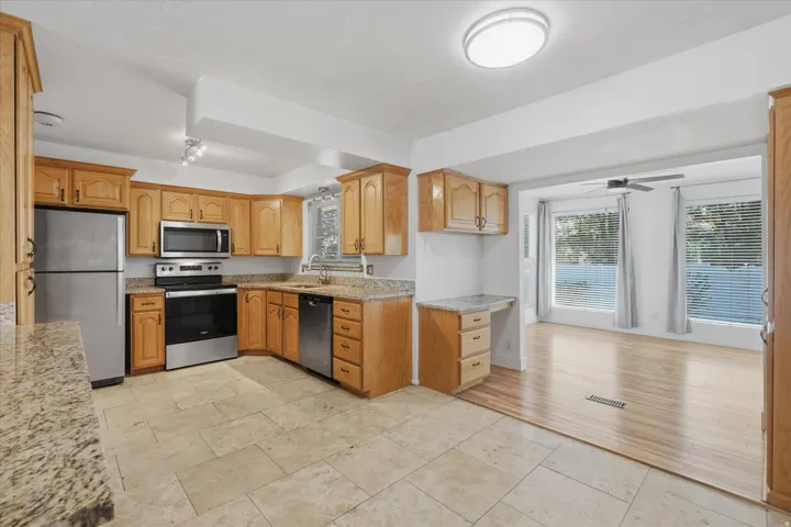 Kitchen opens to sun room/dining room