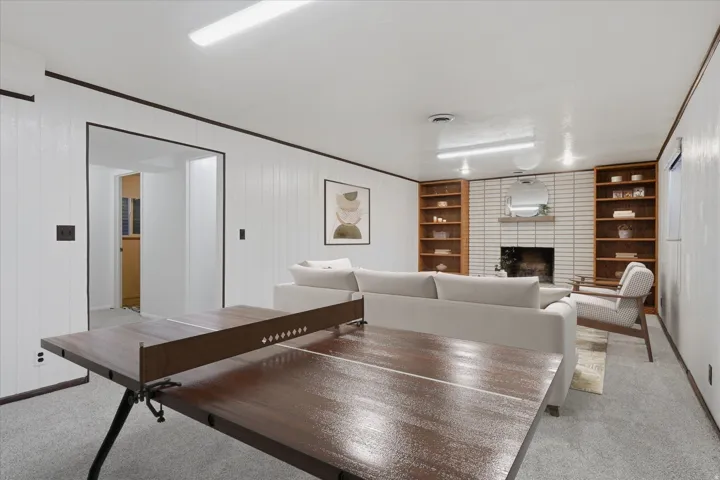 virtually staged family room with ping pong table