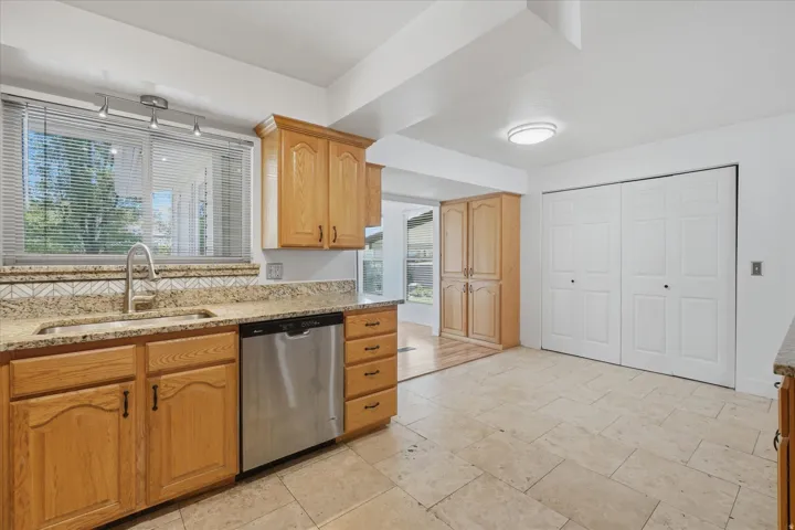 Kitchen with entrance to sunroom
