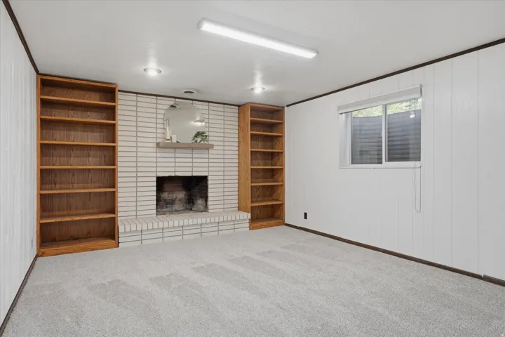 Family room with wood burning fireplace replace..