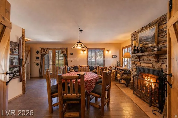 Stone-faced fireplace with a wood mantel