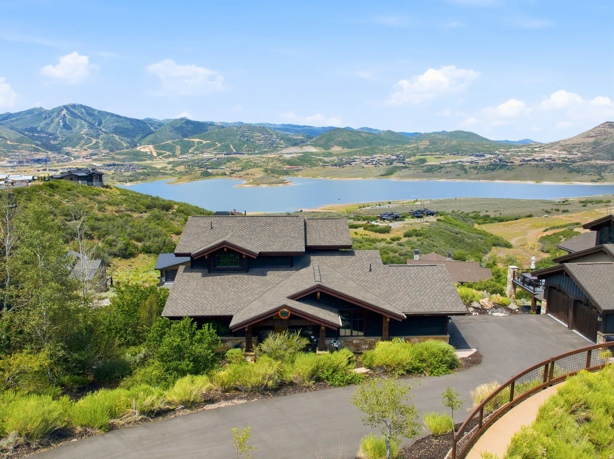 Hillside property with a multi-level design and a dark exterior finish