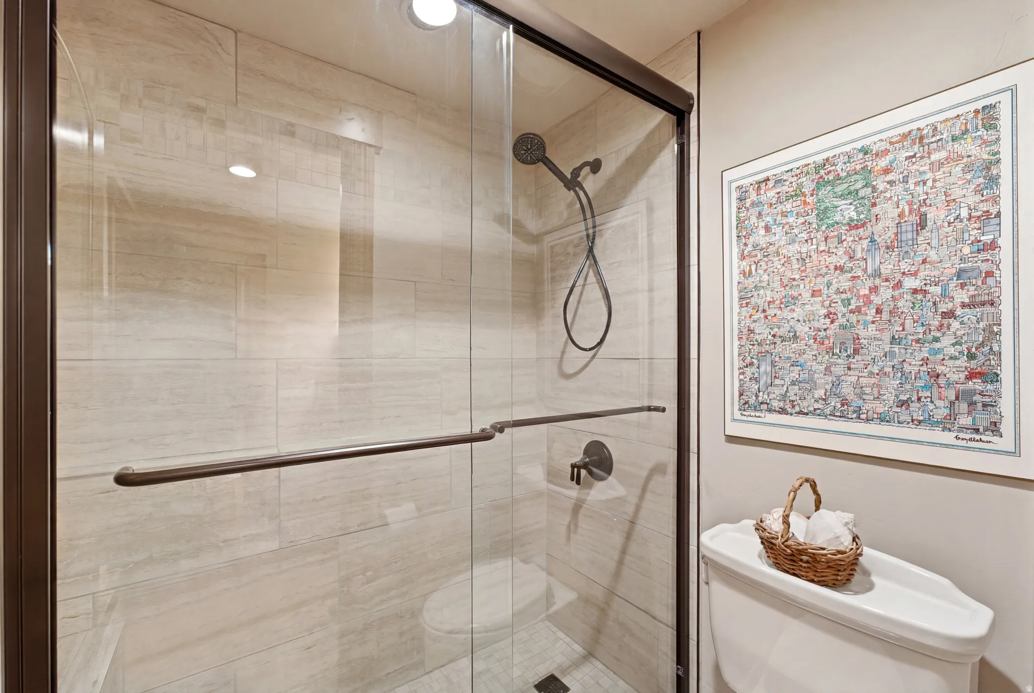 Guest Room Ensuite  Shower enclosure featuring a frameless glass door with bronze-finish hardware