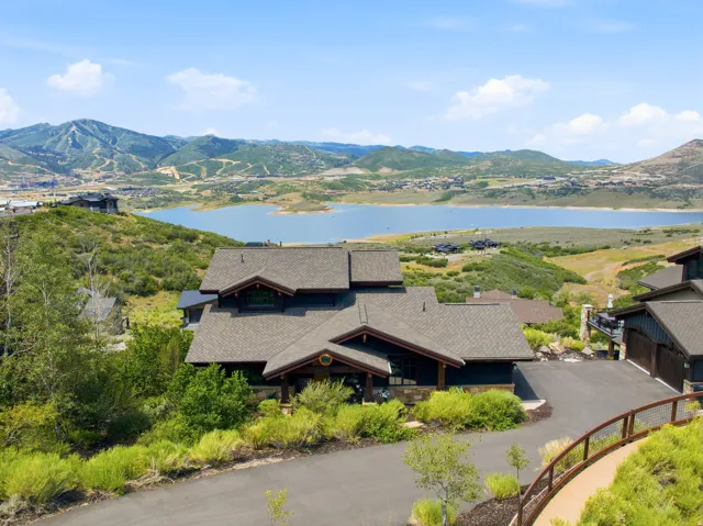 Hillside property with a multi-level design and a dark exterior finish