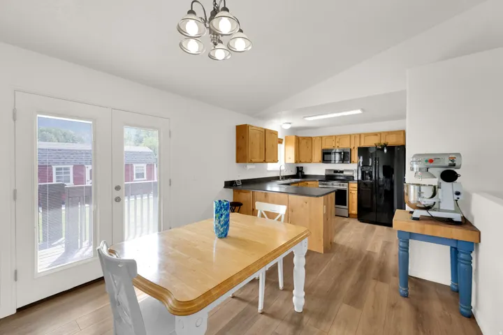 Open-concept kitchen and dining area.