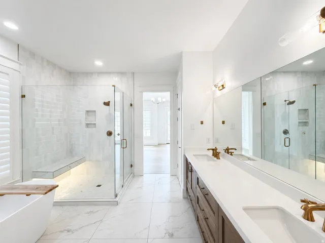 Primary bathroom with large shower with double vanity