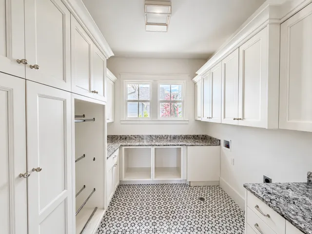Entry level laundry room with lots of natural light