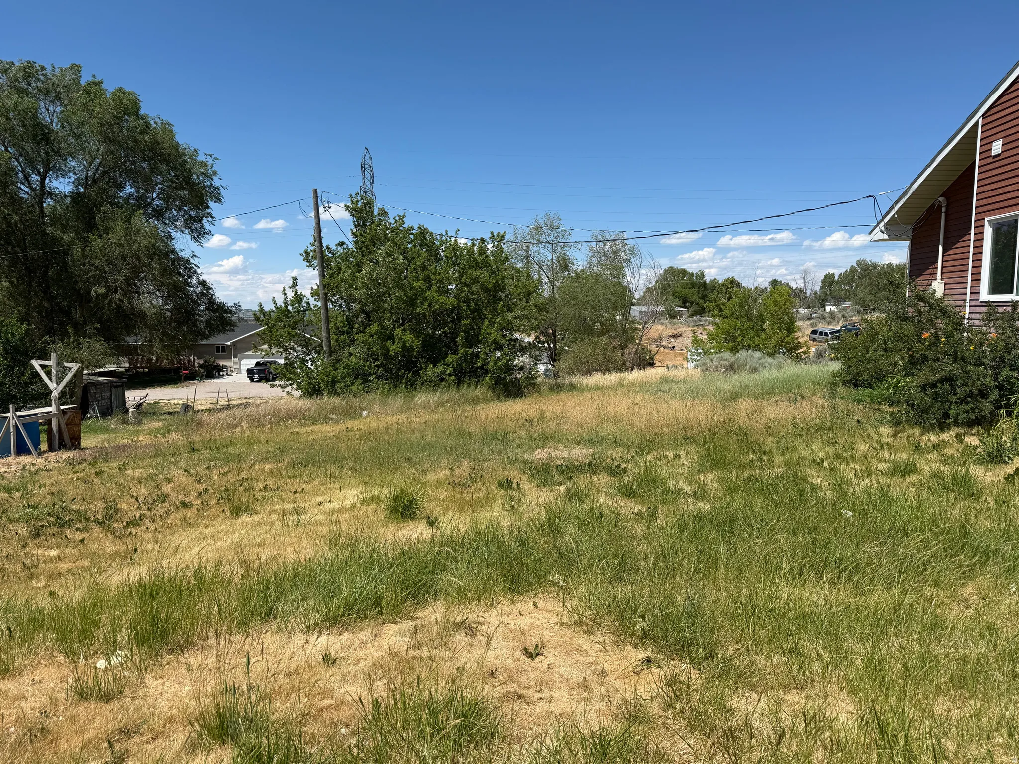 Expansive lot featuring varied terrain and natural vegetation