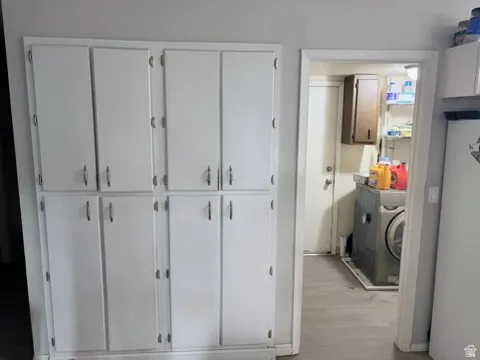 White cabinetry with multiple storage compartments