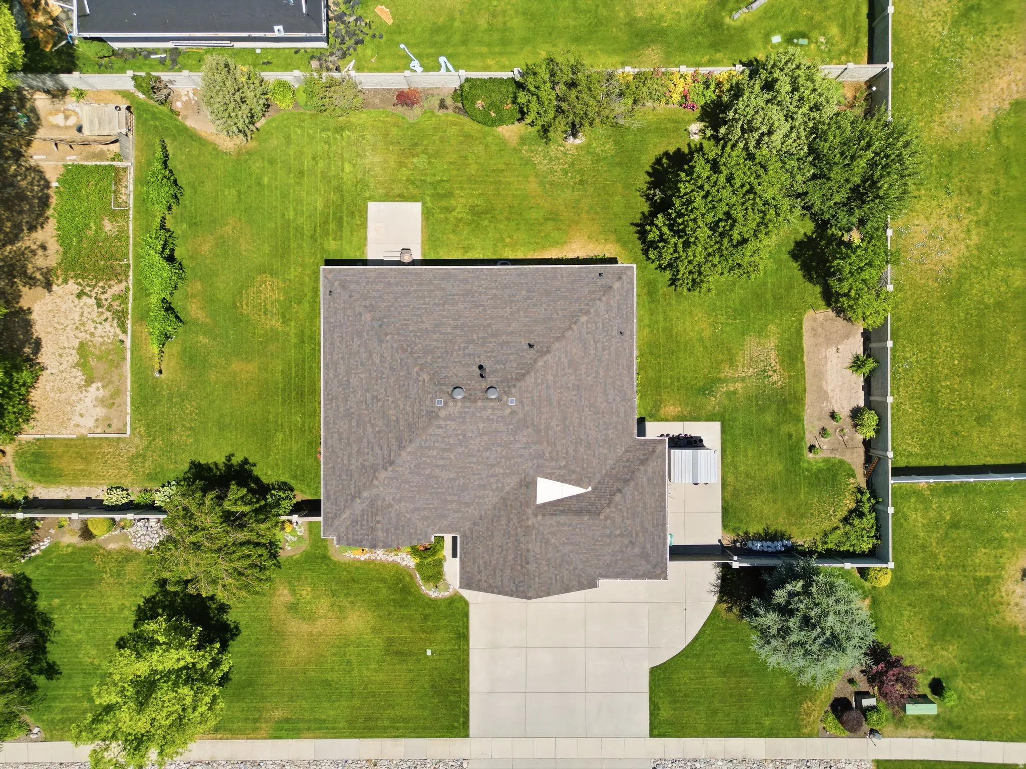 Spacious property with a large, landscaped yard surrounding the home