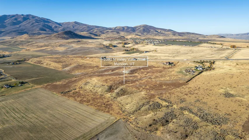 Expansive land parcel featuring varied topography and open fields