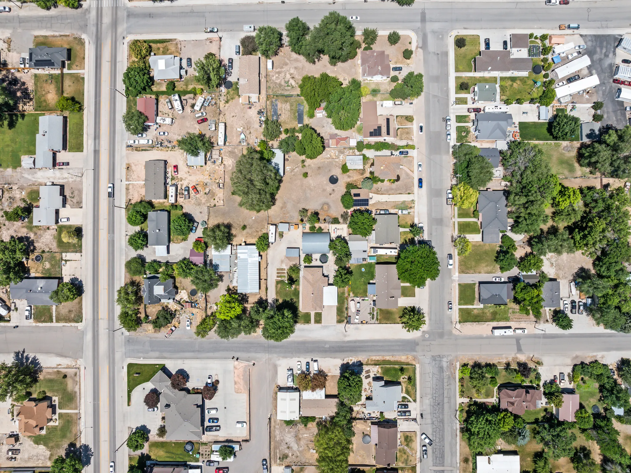 Aerial view showcasing a residential neighborhood with a grid street pattern