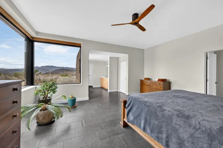 Large picture windows with mountain scenery