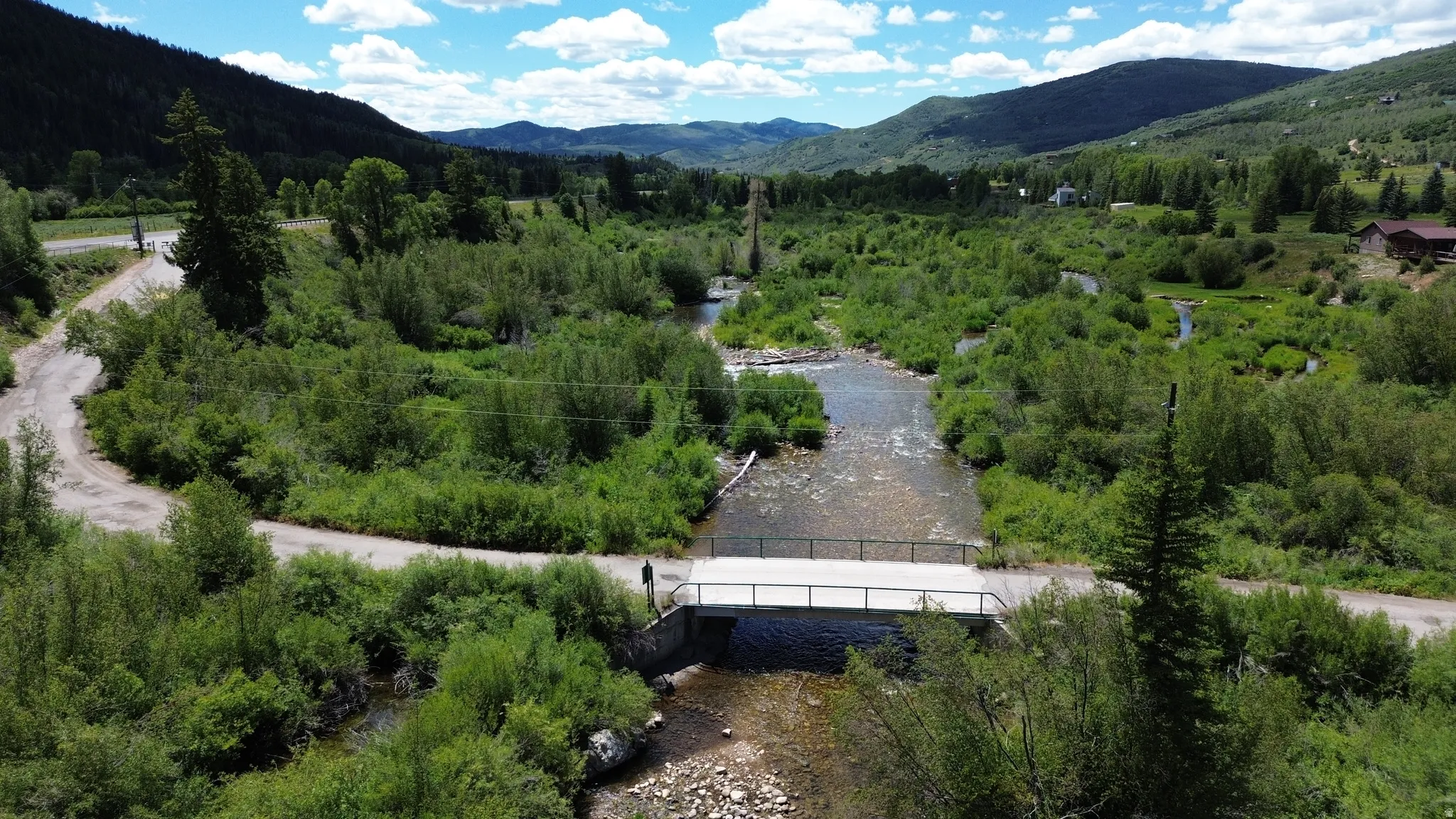 View of the Weber River at bridge at the entry of the subdivision