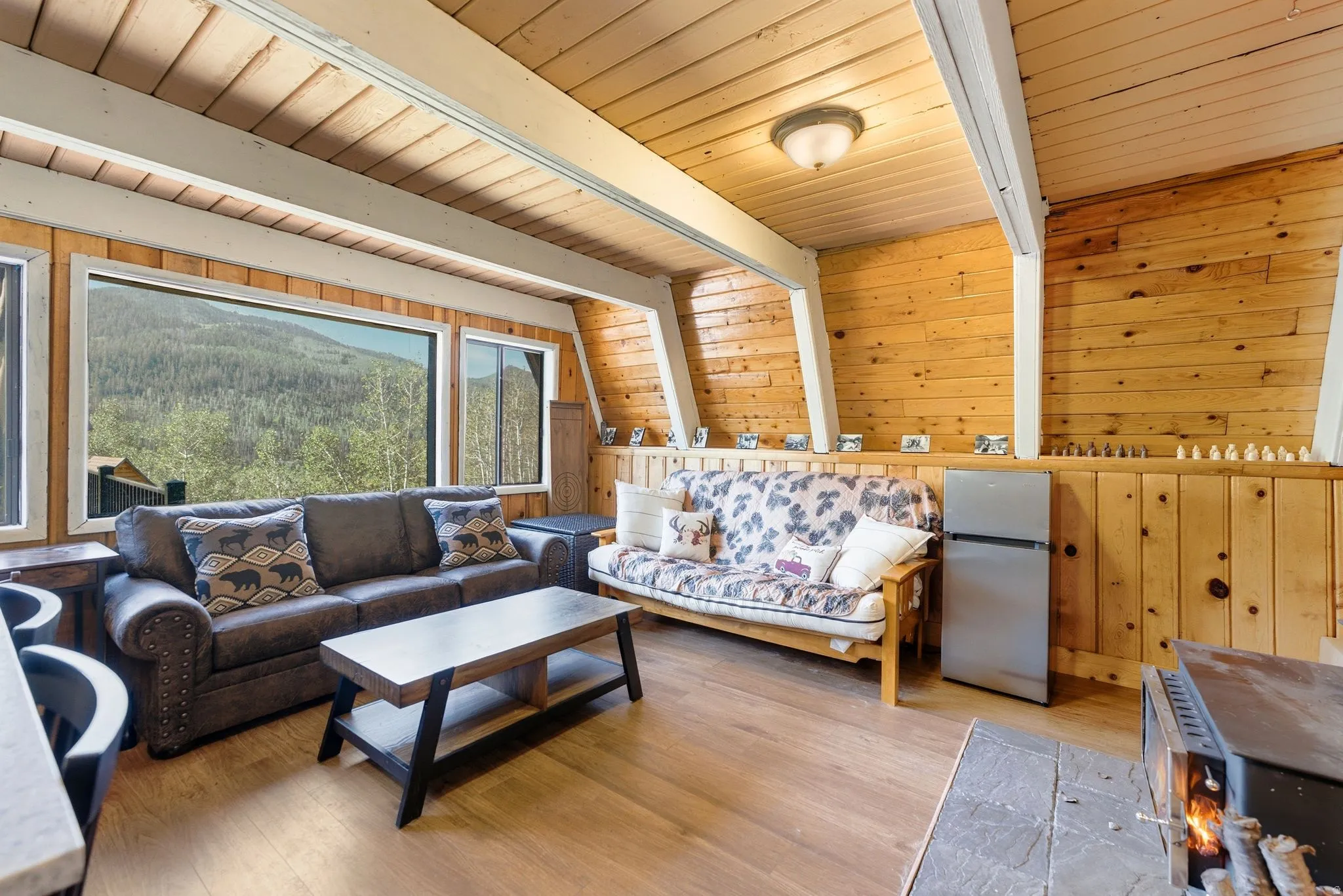 Expansive window wall overlooking mountainous terrain