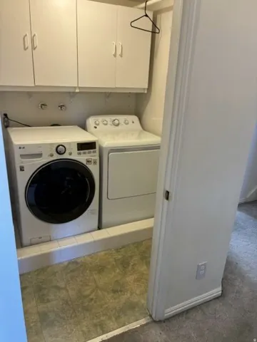 Built-in cabinetry, tile flooring, and utility hookups