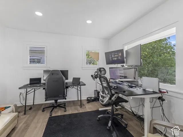 Home 2/2 - 938 E Herbert Avenue -- White walls and recessed lighting complement the wood-finish flooring