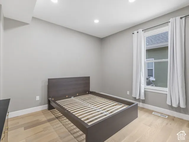 Home 1/2 -- 1046 S Lincoln Street -- Room with light wood-finish flooring and recessed lighting