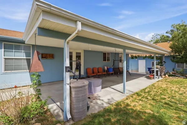 Expansive covered patio with a concrete surface