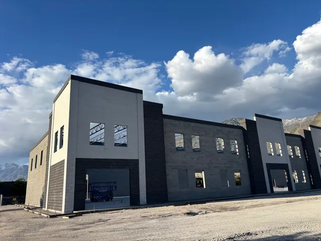Modern commercial structure with a gray and dark gray block facade