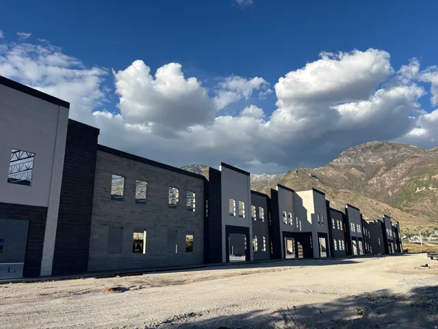 Modern commercial development featuring dark and light block construction