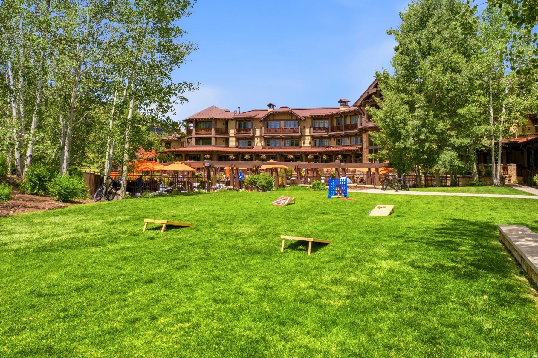 Expansive green lawn providing an outdoor recreational area