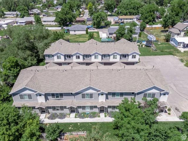 Aerial perspective showcasing two parallel rows of multi-unit residential structures
