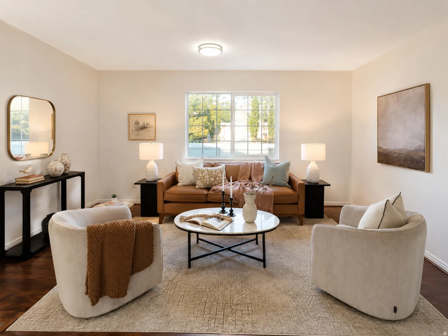 Bright living area featuring wood-finish flooring, a contemporary window with multiple panes, and light-toned wall finishes