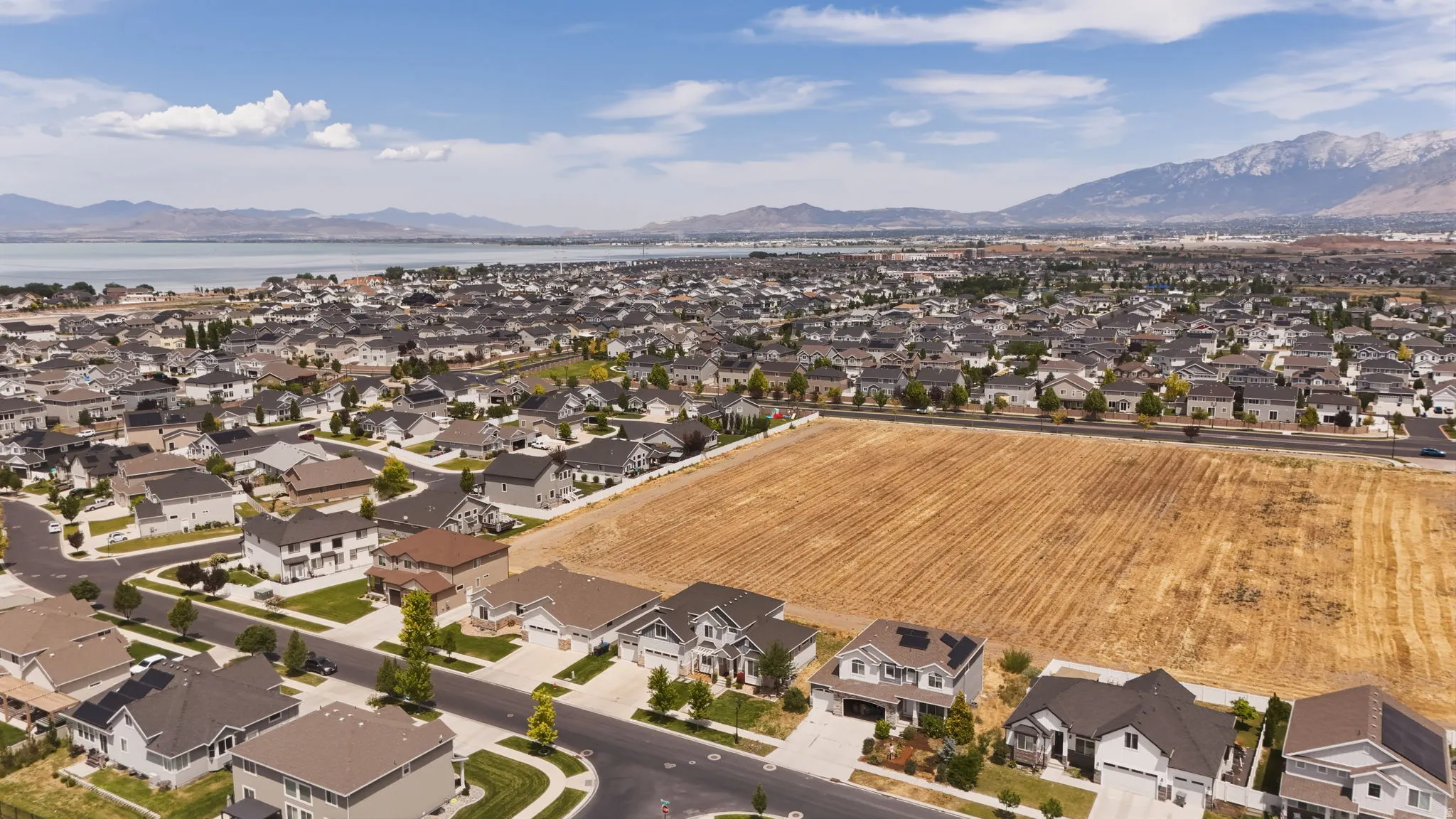 Expansive residential development featuring numerous homes with varied architectural styles