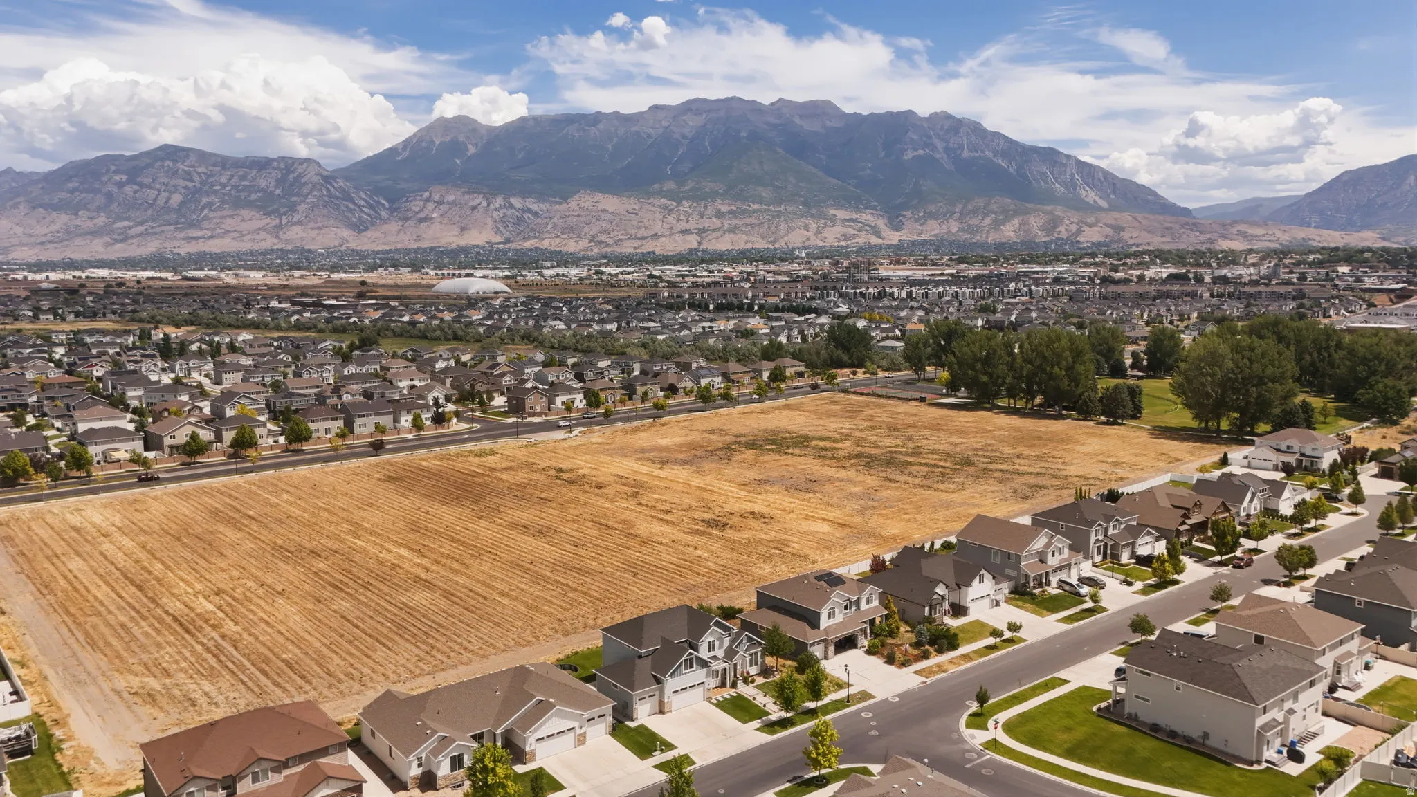 Expansive residential area with a prominent mountain backdrop