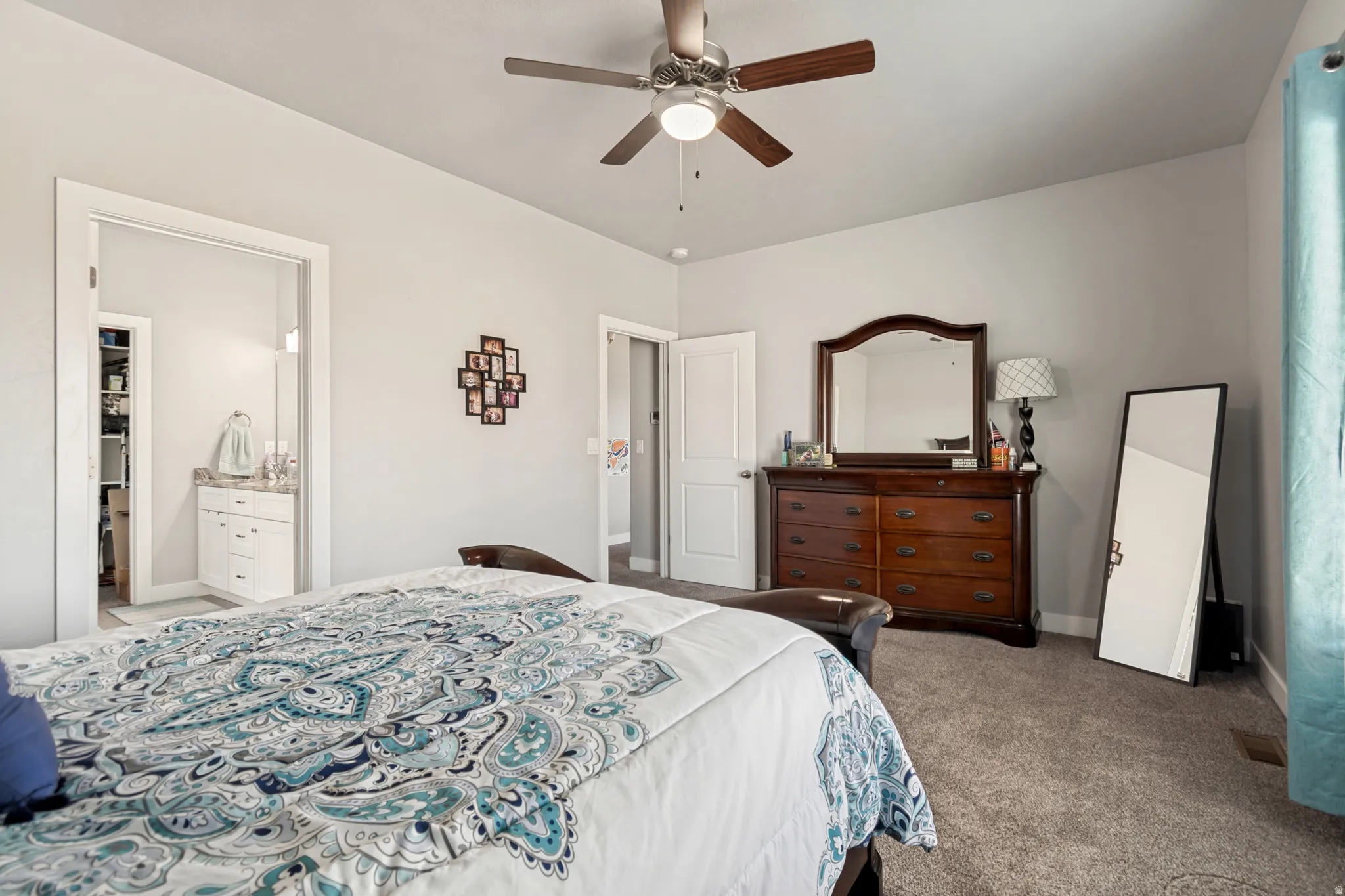 Neutral gray wall paint complementing gray carpeting