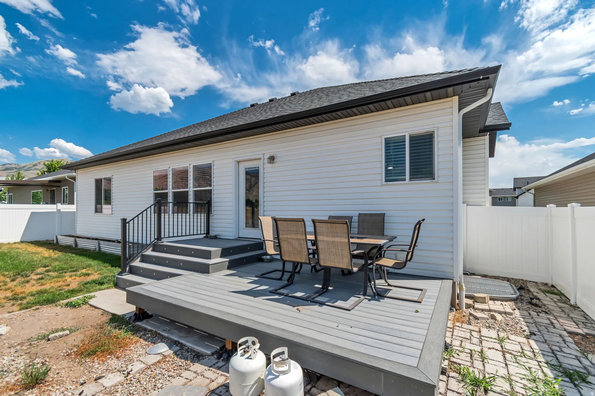 Spacious outdoor deck with a multi-level design and composite decking