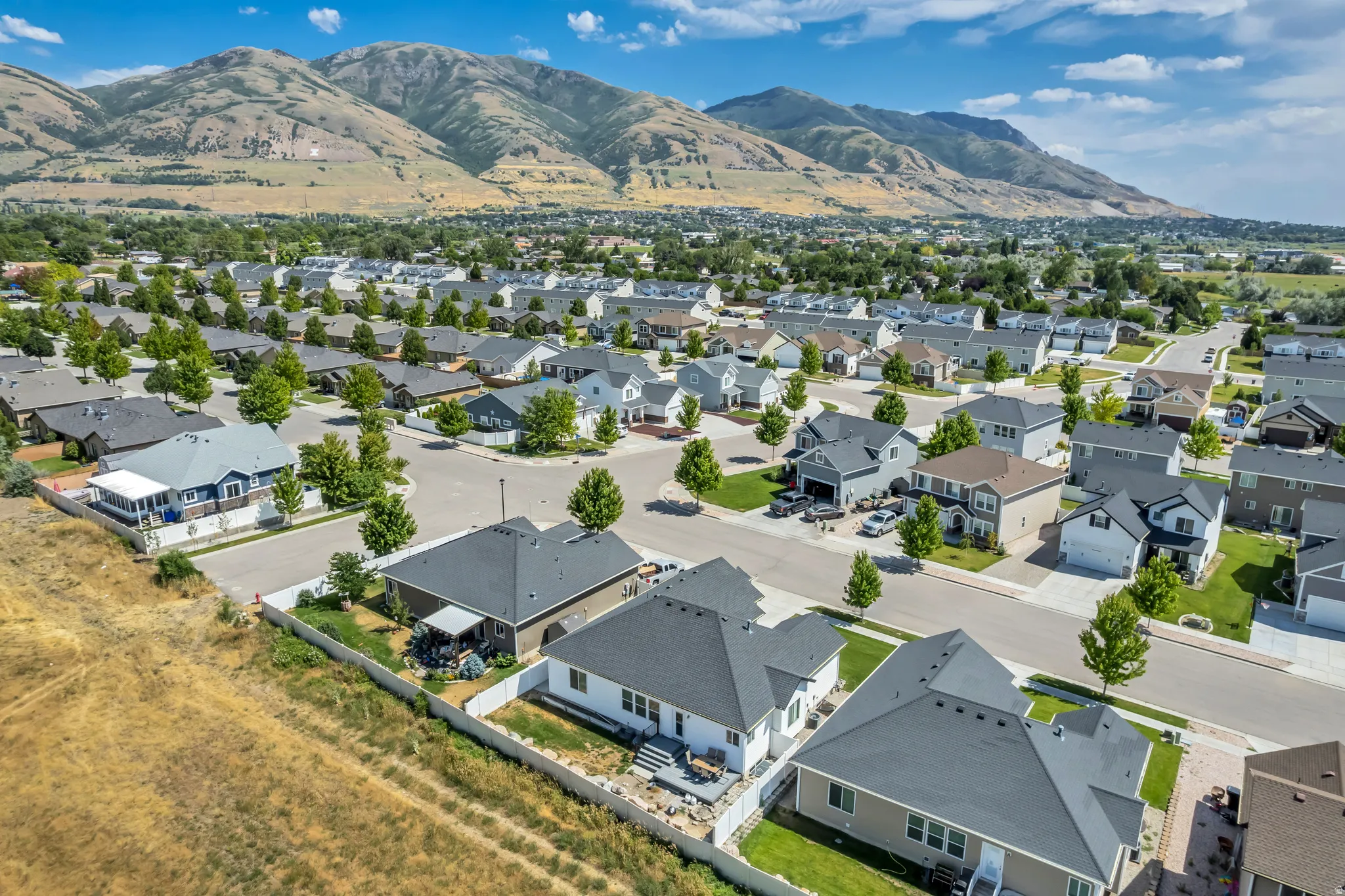 Residential neighborhood featuring a variety of single-family homes with mountain scenery