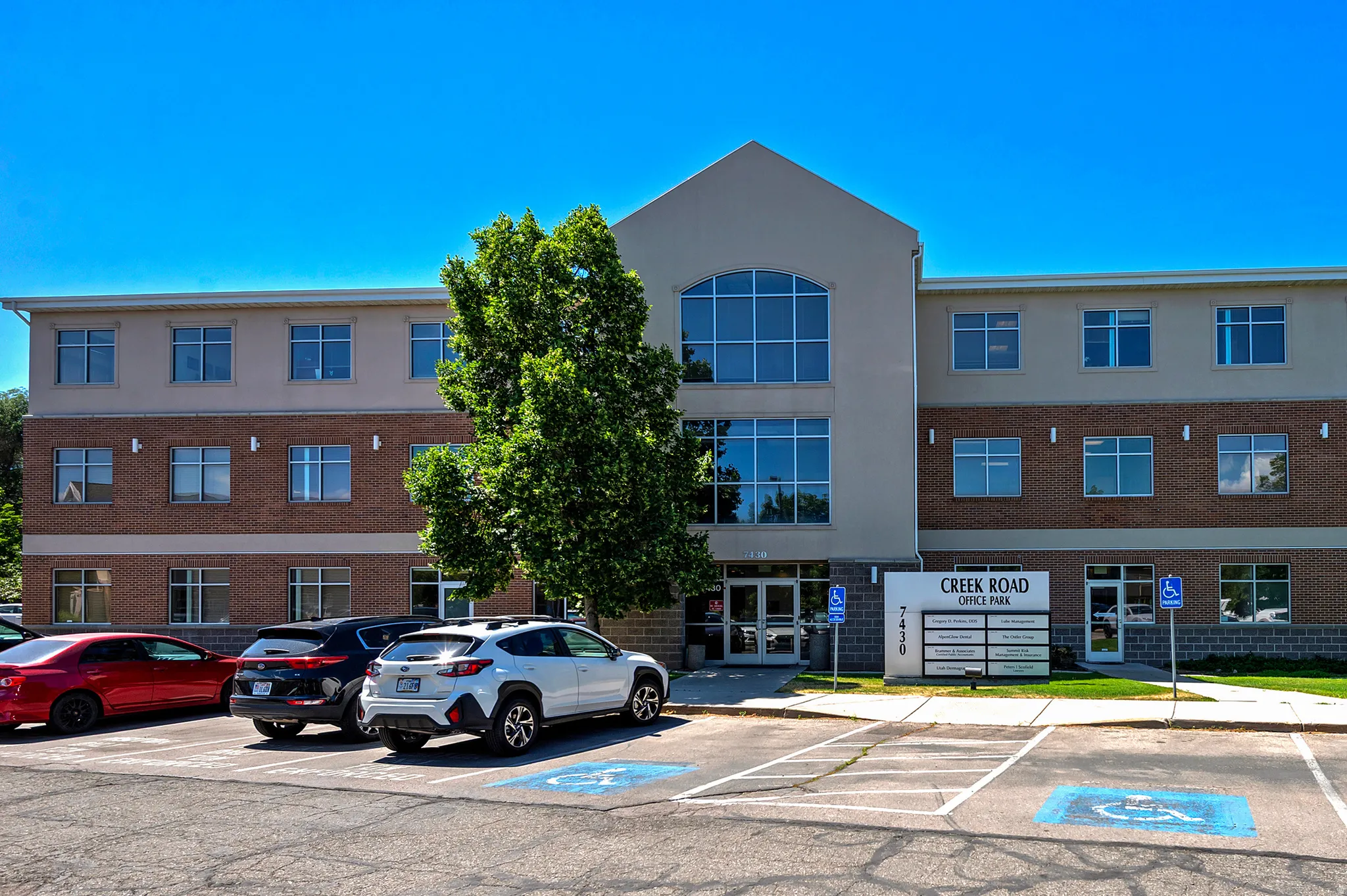Professional office building featuring a brick and stucco exterior