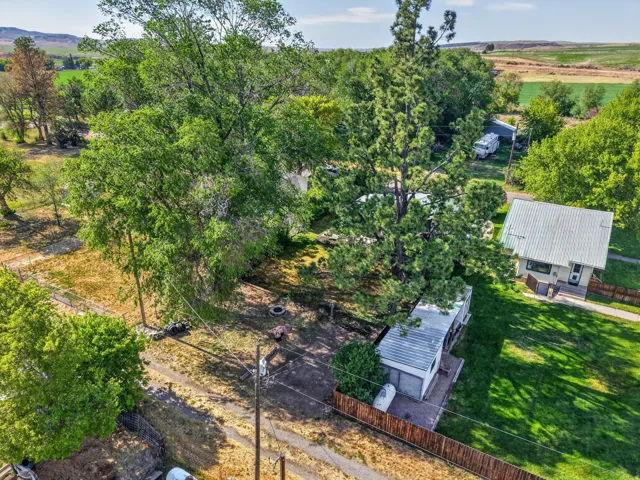 Expansive lot featuring mature trees providing ample shade