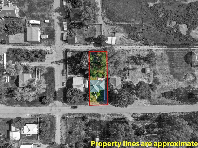 Aerial Property View. Illustrating the property boundaries and surrounding area