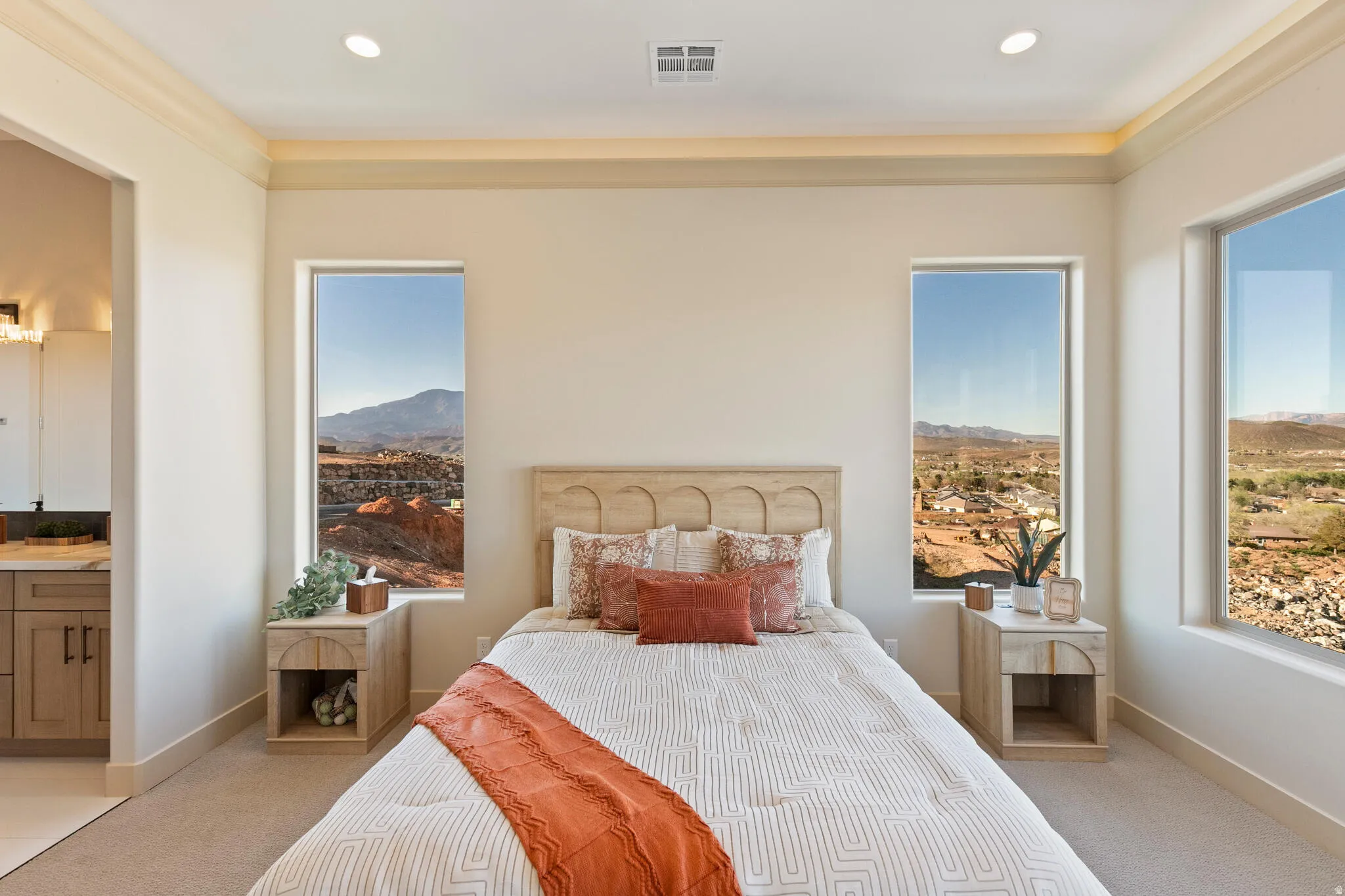 Bright interior space featuring recessed lighting, crown molding, and coved ceiling detail