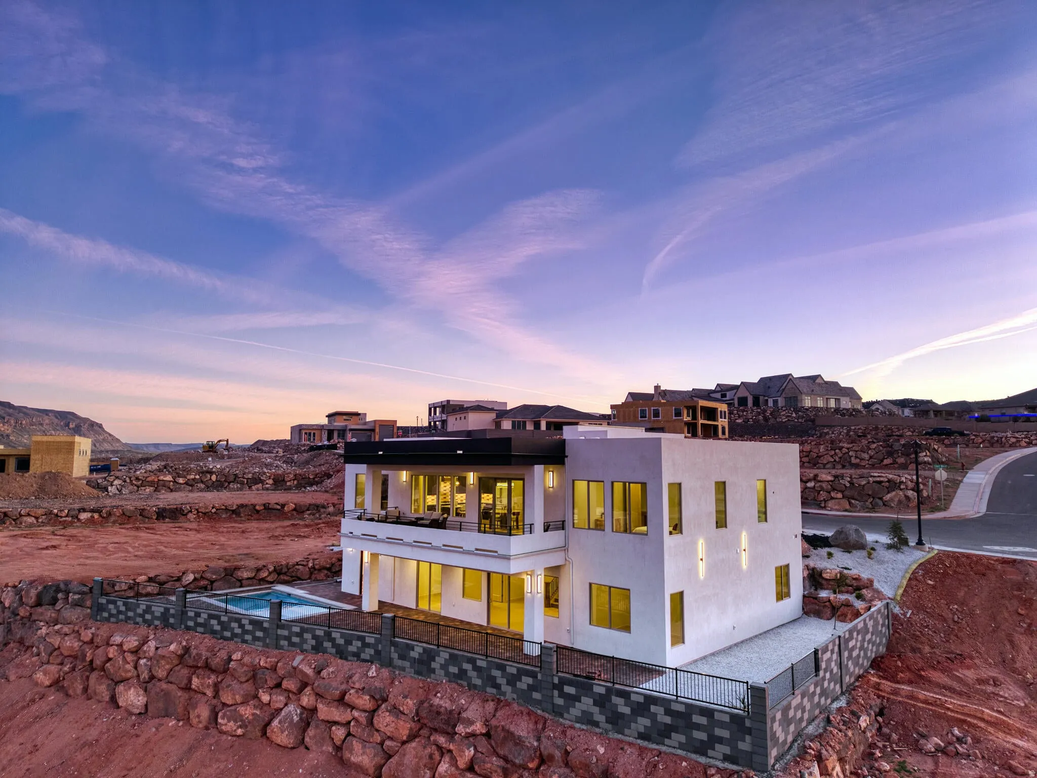 Contemporary white stucco exterior with a flat roofline