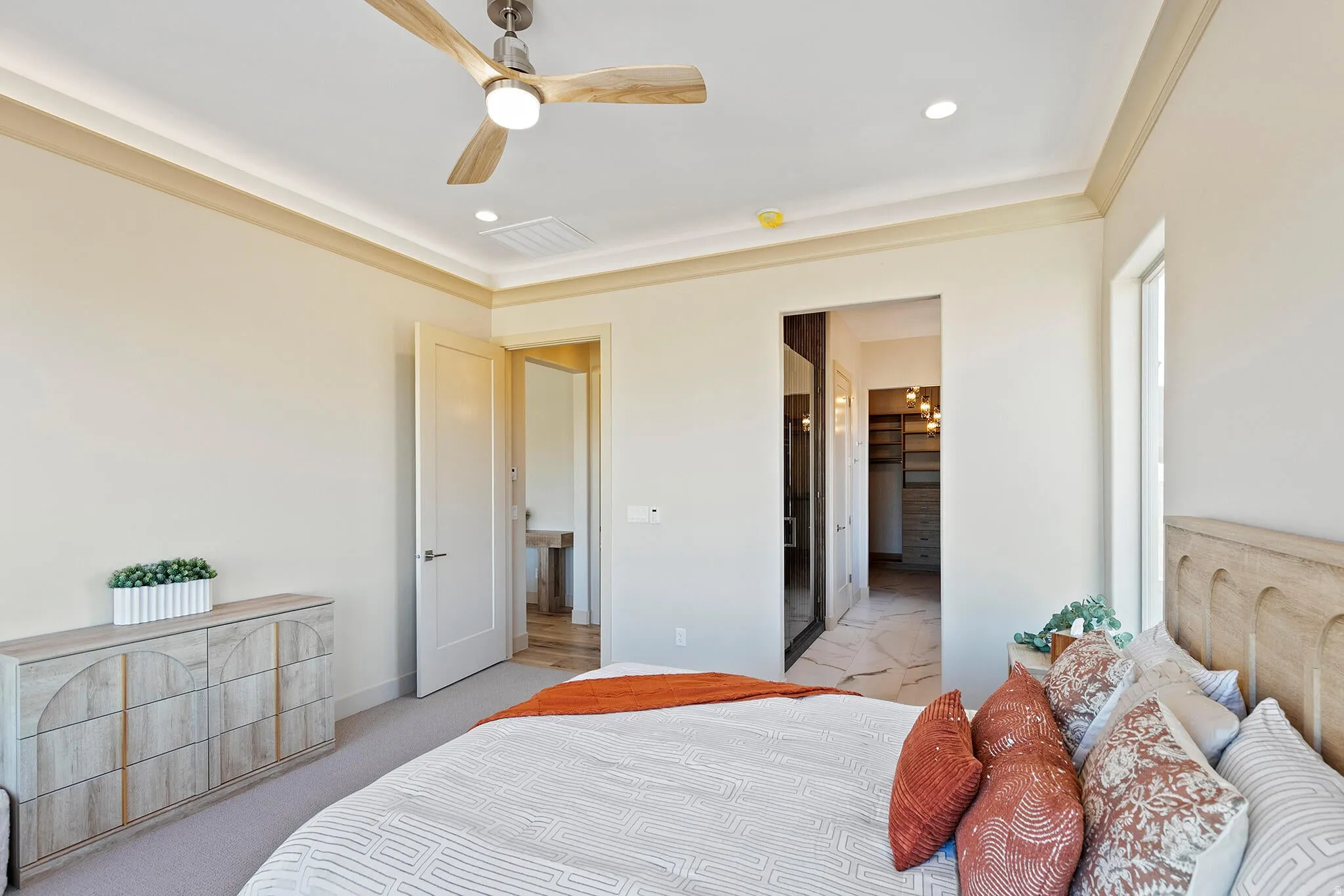 Bedroom featuring crown molding, recessed lighting, and a modern ceiling fan