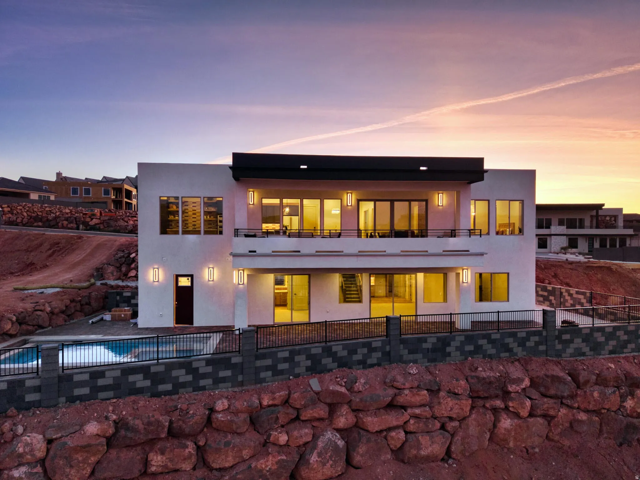 Contemporary exterior with multiple balconies and a multi-level design