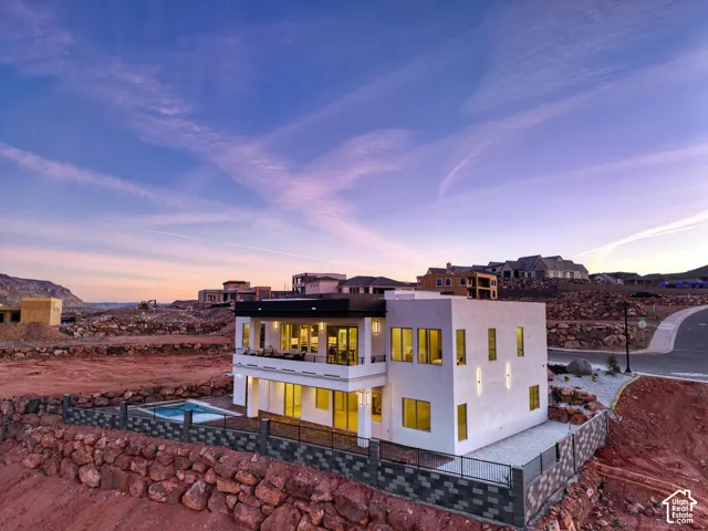 Contemporary white stucco exterior with a flat roofline