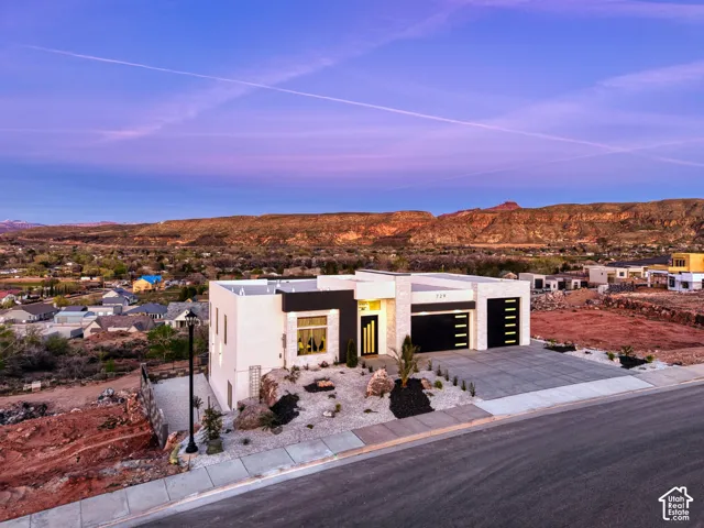 Contemporary architecture with a striking facade featuring dark accents and large windows
