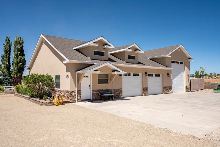 Stucco exterior with stone veneer detailing