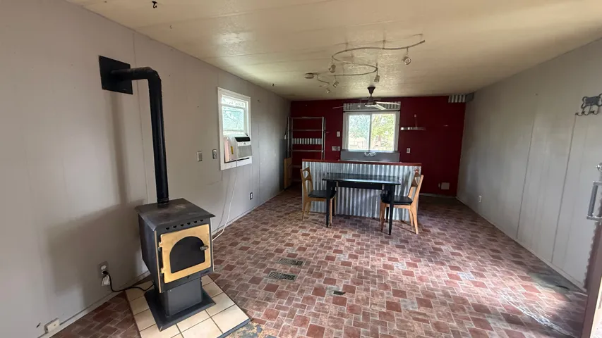 Freestanding wood-burning stove with a tile hearth