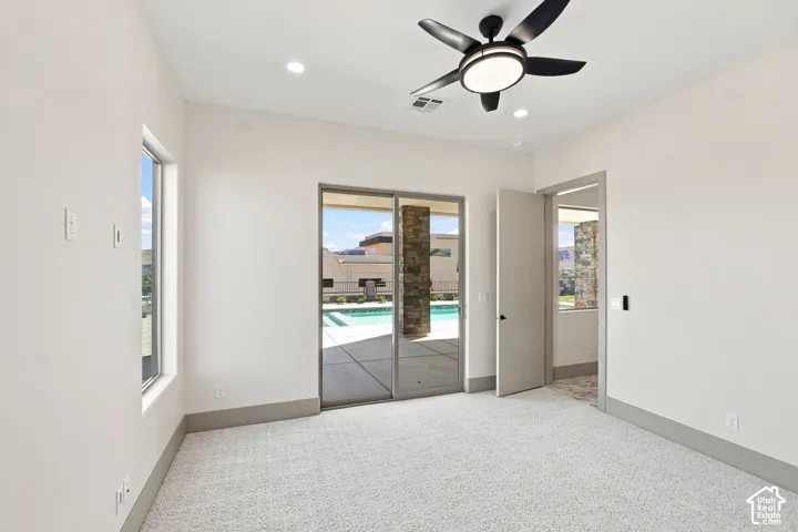 Recessed lighting and a contemporary ceiling fan with integrated lighting