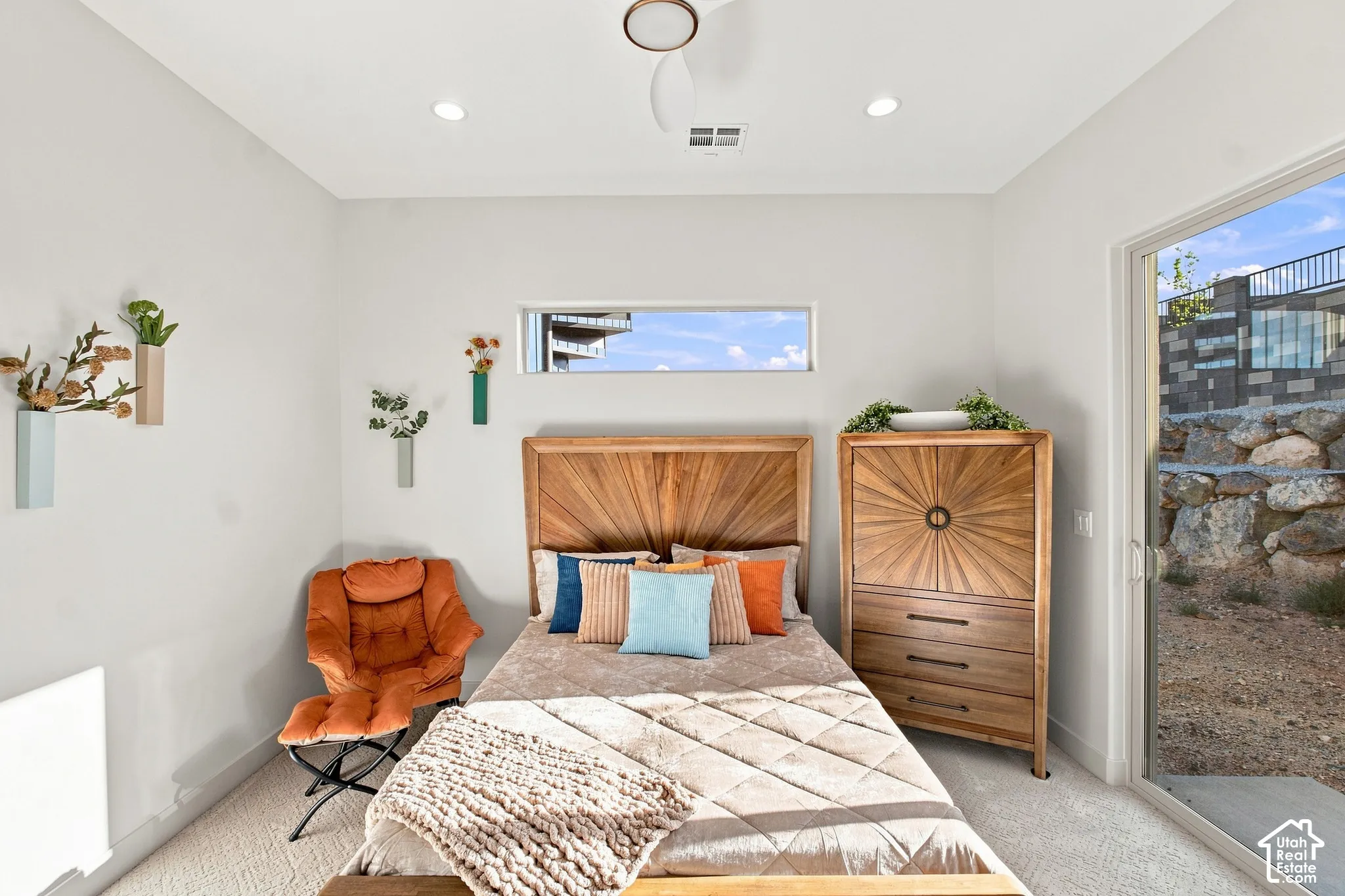 Room featuring recessed lighting, a horizontal window, a ceiling fan, and a sliding glass door