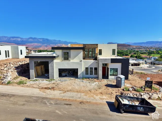 Contemporary multi-level exterior with a flat roofline