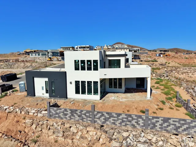 Contemporary multi-level exterior with a flat roofline