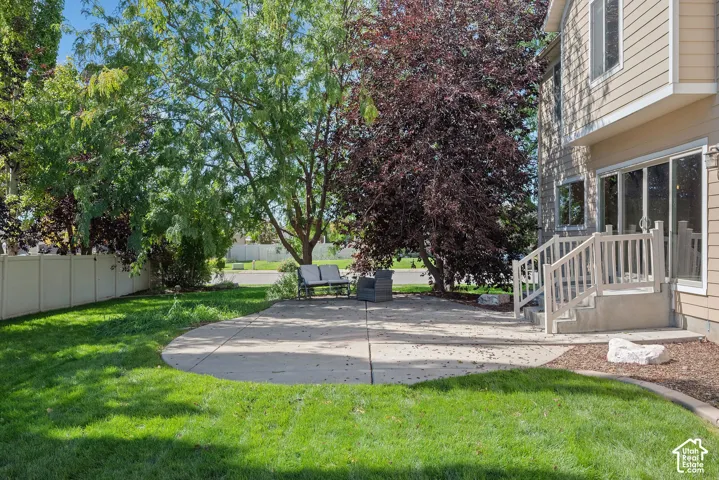 Beautifully landscaped 0.30-acre lot with mature greenery and room to enjoy the outdoors.
